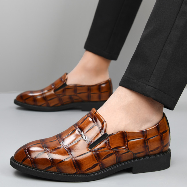 Premium men's executive black slip-on loafers, offering classic style and lightweight comfort for professionals.