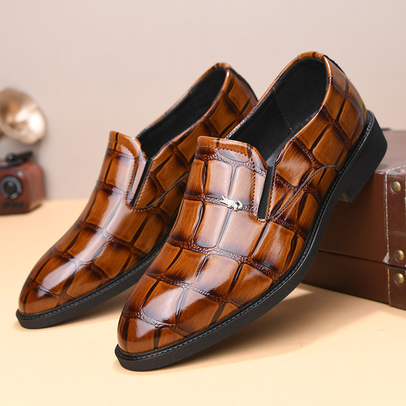 Smooth black leather men's slip-on executive loafers, polished finish, suitable for any formal event.