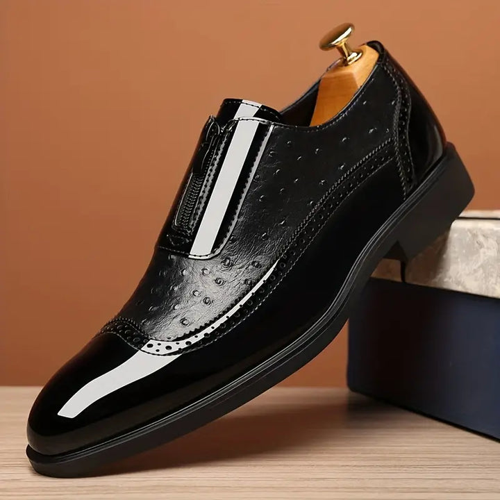 Close-up of men's exotic pattern loafers, showcasing the sleek side zip accent & refined formal appeal.