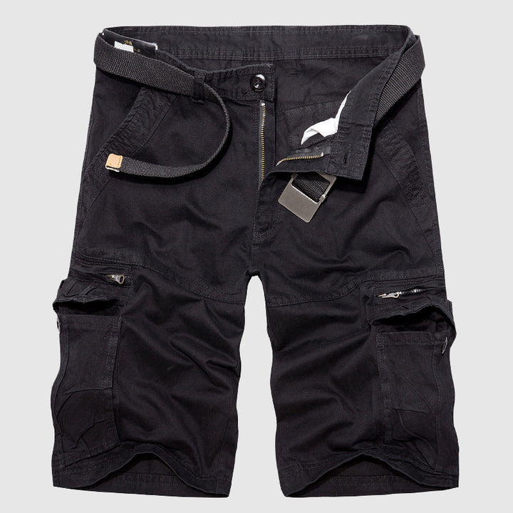 Close-up of men's cargo shorts pocket detail, highlighting secure button closure & robust fabric.