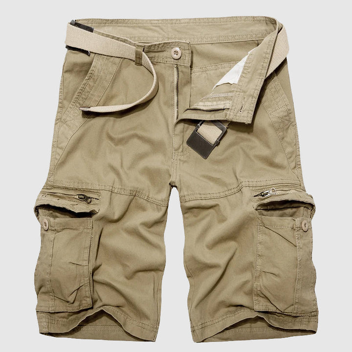 Model wearing Men's Explorer cargo shorts, demonstrating comfort & fit for outdoor exploration.