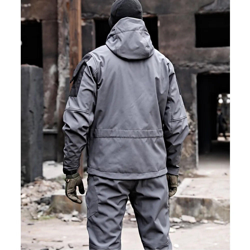 Men's Falk waterproof outdoor set with versatile jacket & trousers. Essential cold weather & rain gear for explorers.