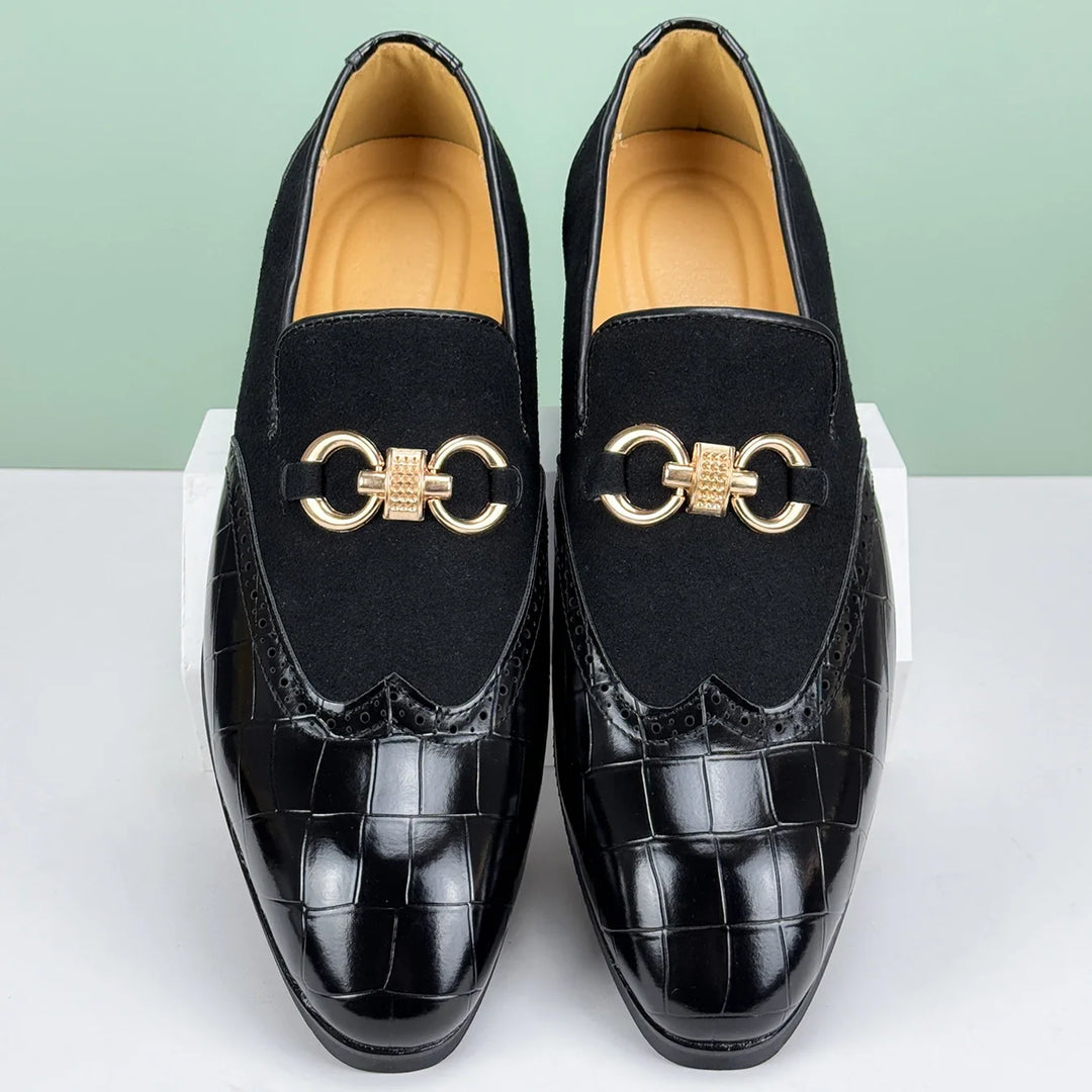 Luxurious men's slip-on loafers, black, featuring a prominent golden bit. Fashionable and comfortable dress shoes.