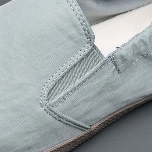 Men's lightweight slip-on shoes for summer. Breathable, comfortable, and easy to wear travel footwear.