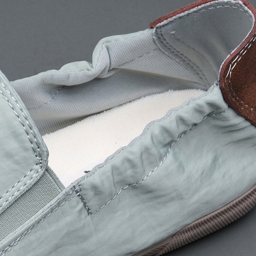 Casual men's slip-on shoes with a featherlight design. Breathable and comfortable for all-day wear and travel.