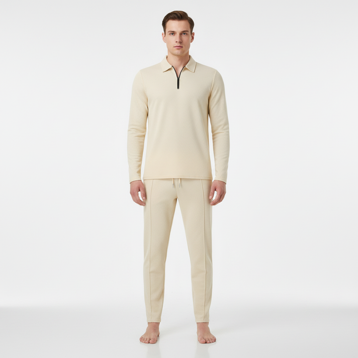 Side view of model wearing Felix men's sporty leisure set, showing fit of long-sleeve and joggers.