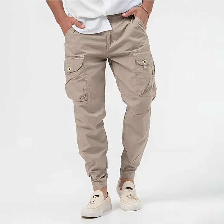 Athletic men's stretch cargo pants designed for maximum movement & all-day comfort, ideal for activewear.