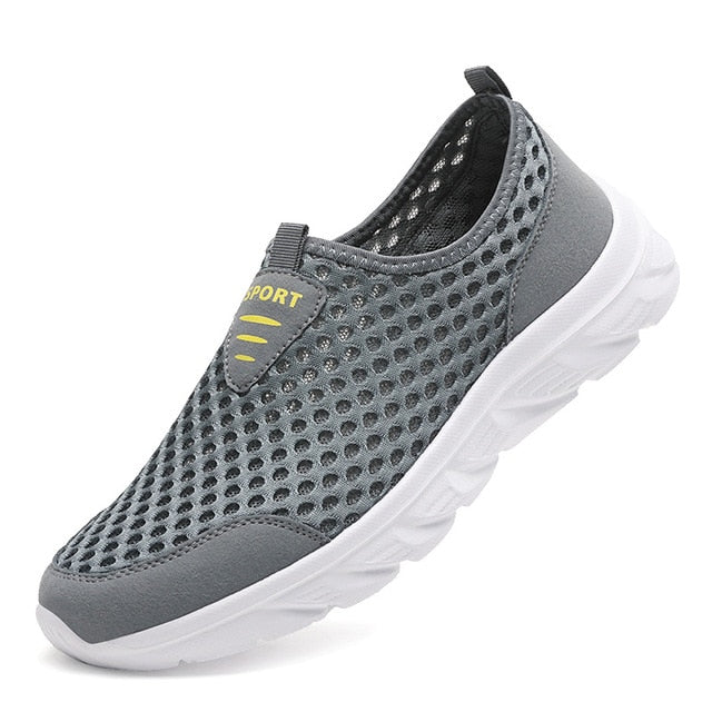 Side view of men's FlexAir Mesh orthopedic slip-on sneakers, offering superior comfort and support.