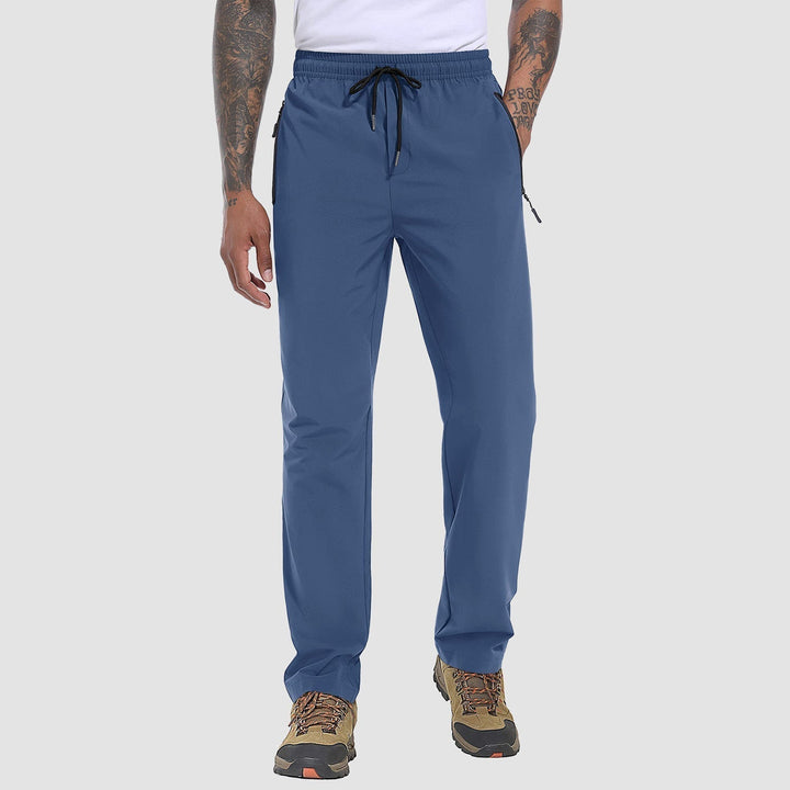 Back view of FlexiTrek men's quick-dry stretch outdoor trousers, highlighting functional design & fit.