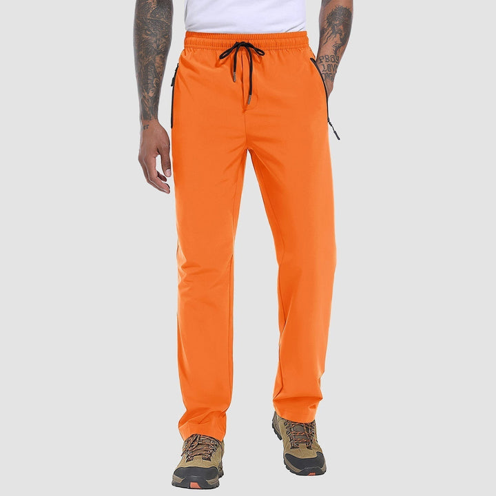 Rugged FlexiTrek men's quick-dry stretch outdoor trousers, built for tough trails, comfort & durability.