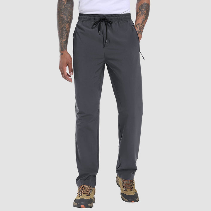 Stretchy, quick-dry men's FlexiTrek hiking pants for ultimate outdoor comfort & performance on trails.