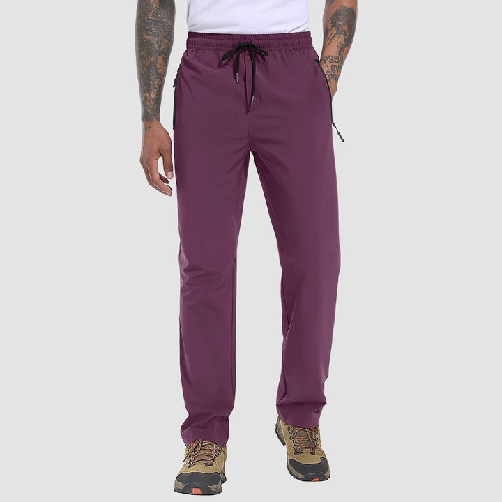 Comfortable men's FlexiTrek athletic stretch pants, quick-dry for demanding outdoor activities & treks.