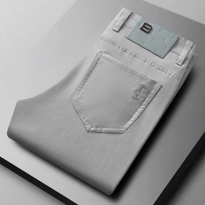 Men's Flextail performance trousers, tailored fit cotton blend stretch pants for comfort and versatility.