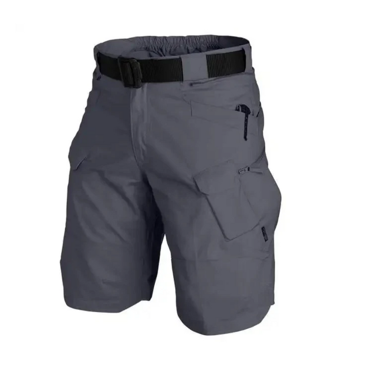 Close-up of the durable fabric and secure zip pockets on FlexTrek Elite men's outdoor cargo shorts