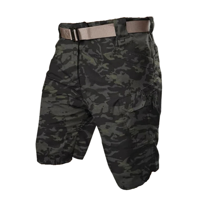 FlexTrek Elite men's outdoor shorts in a neutral color, folded neatly to show quick-dry fabric