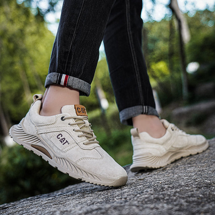 Sand-colored Forge men's sneakers, providing comfort & durability for urban walking.