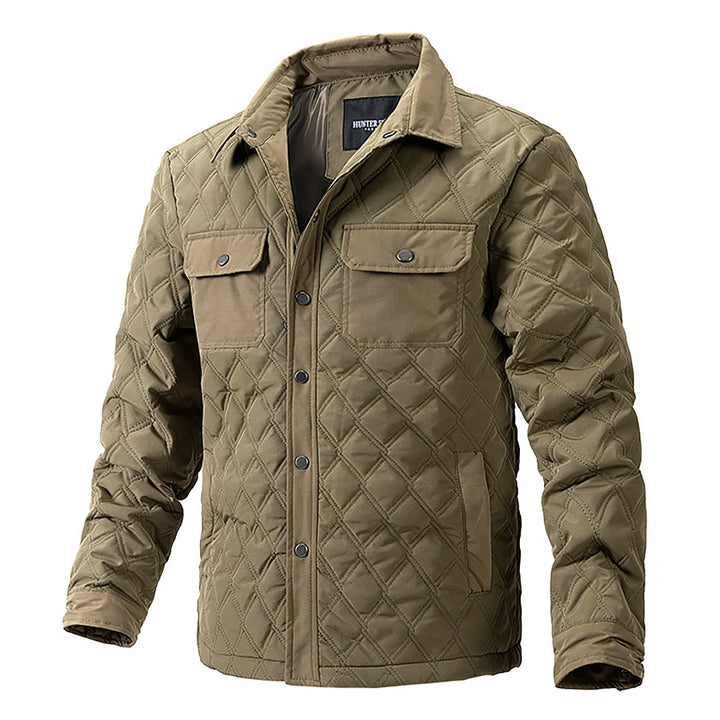 Men's Forge Quilted Jacket in rugged outdoor style, featuring snap closure & chest pockets. Durable & versatile.