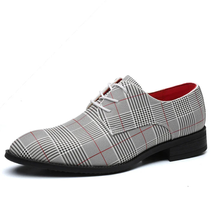 High-quality men's oxford dress shoes with striking plaid contrast, perfect for formal & business occasions.