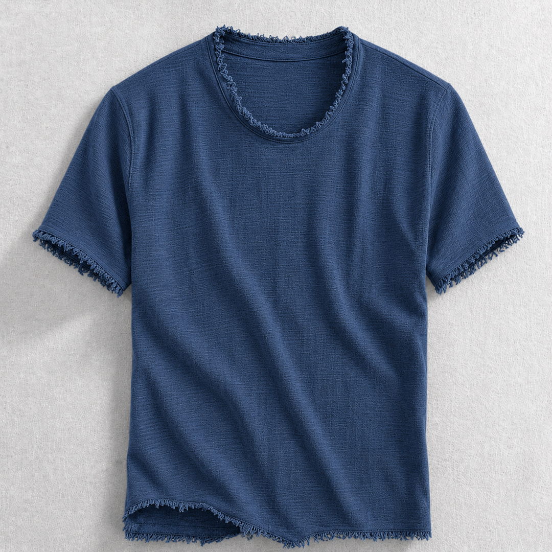 Texture shot of a soft cotton blend t-shirt with subtle frayed edges, showcasing comfortable & modern men's casual wear.
