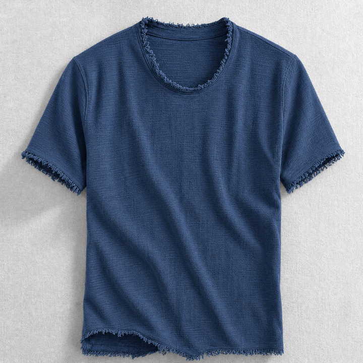 Texture shot of a soft cotton blend t-shirt with subtle frayed edges, showcasing comfortable & modern men's casual wear.