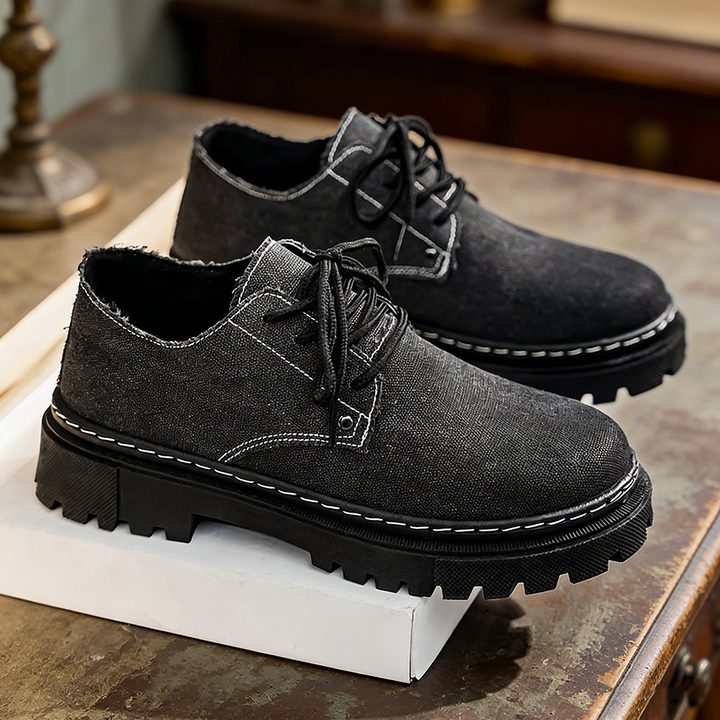 Lace-up men's frayed denim shoes, offering comfortable & stylish summer fashion.