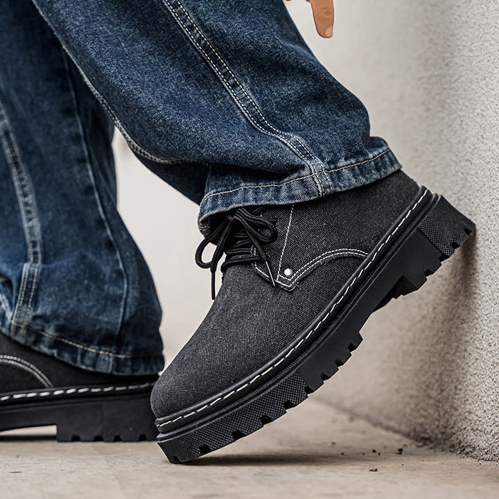 Side view of men's stylish frayed denim shoes, comfortable casual summer footwear.
