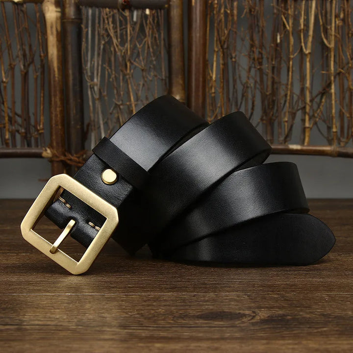 Black full-grain leather dress belt for men. Premium, durable accessory with classic brass buckle for everyday wear.
