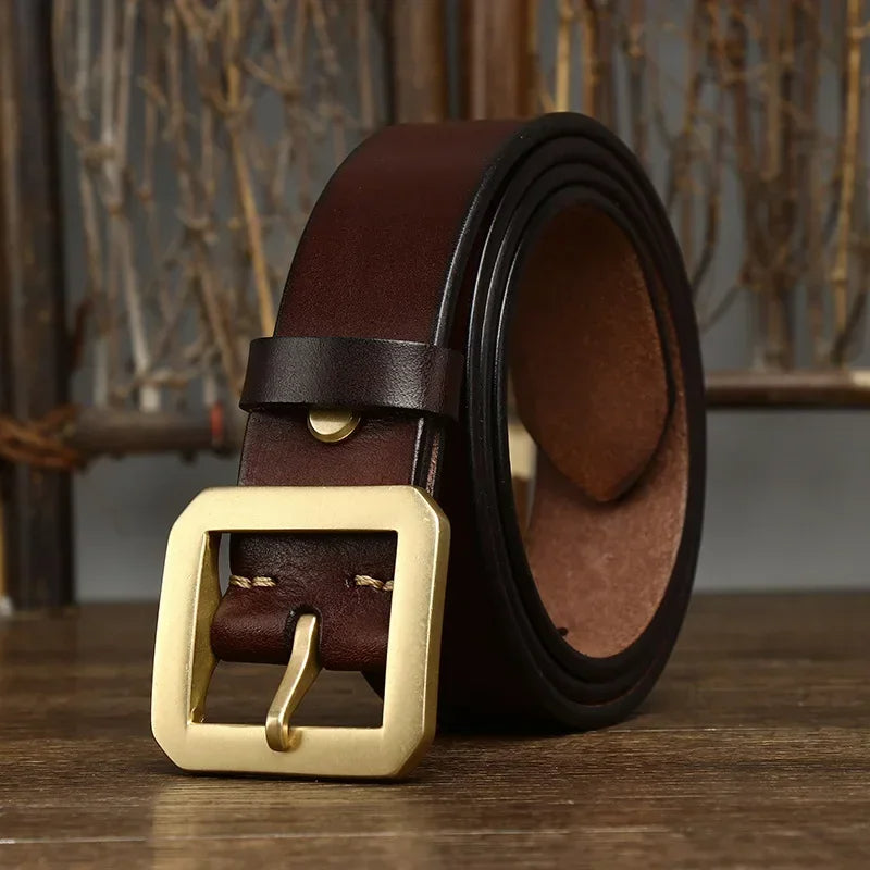 Durable men's full-grain leather belt featuring a sturdy brass buckle. Premium casual & dress accessory for everyday use.