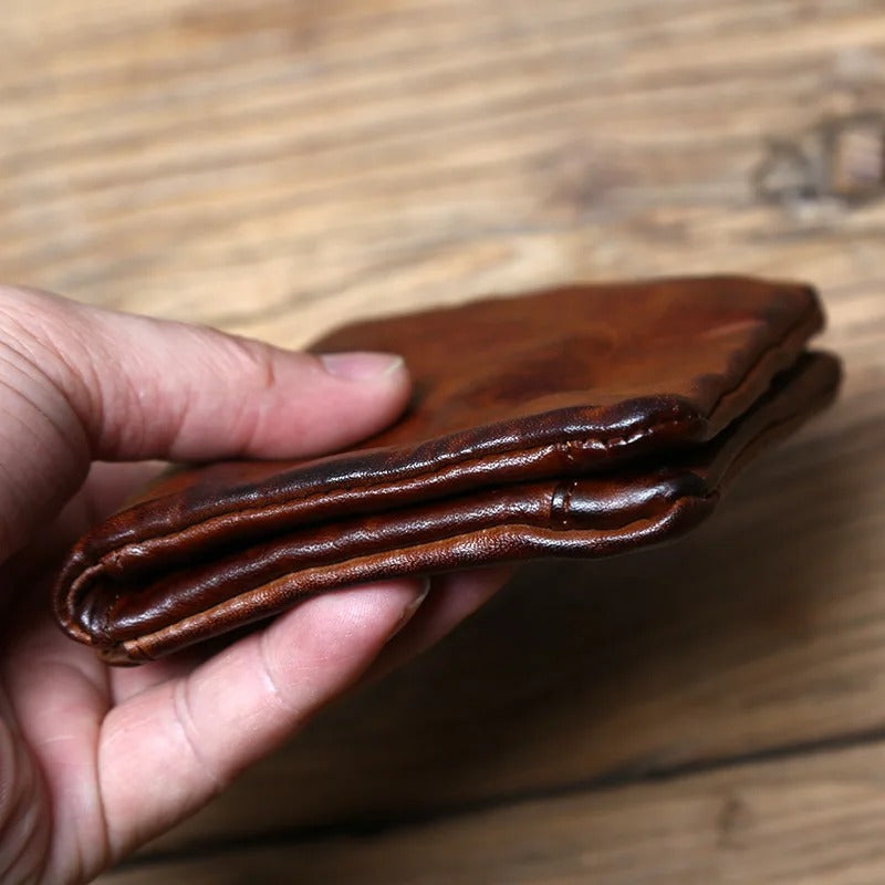 Back view of durable full-grain leather men's wallet, emphasizing its sleek, classic profile and design.