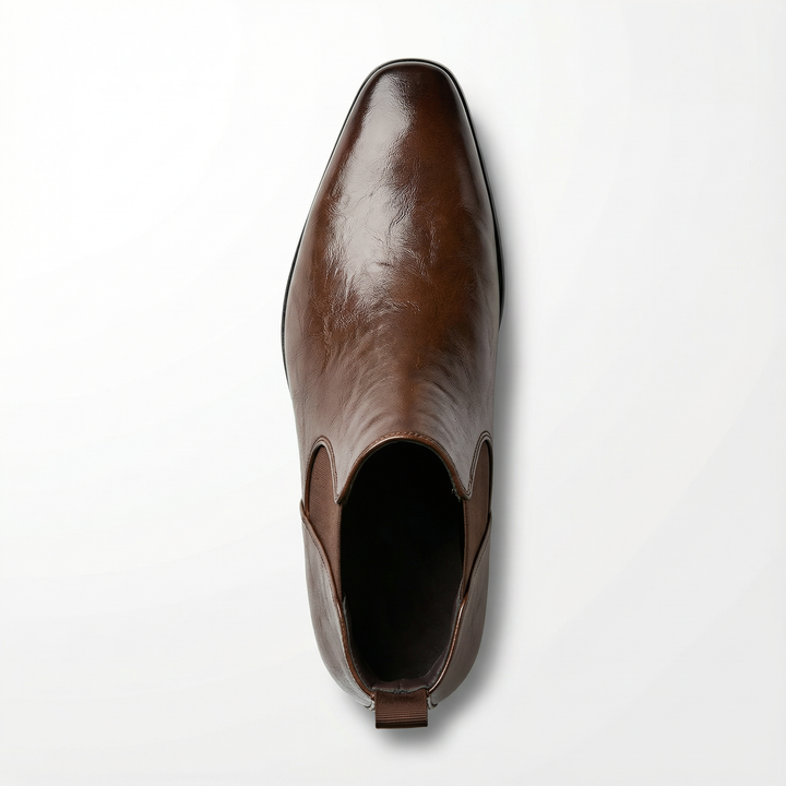 Easy slip-on full-grain leather Chelsea boots for men, blending comfort and enduring style.