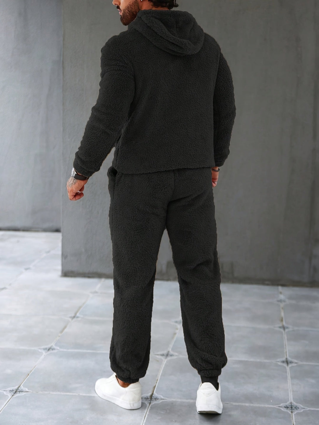 Stylish men's fleece hoodie and jogger set in dark green, designed for cozy comfort & winter warmth.