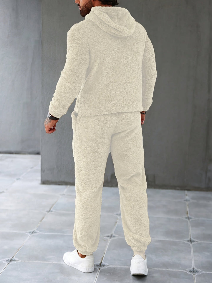 Ultimate warmth in a men's fuzzy fleece hoodie & joggers set, perfect for winter loungewear & casual comfort.
