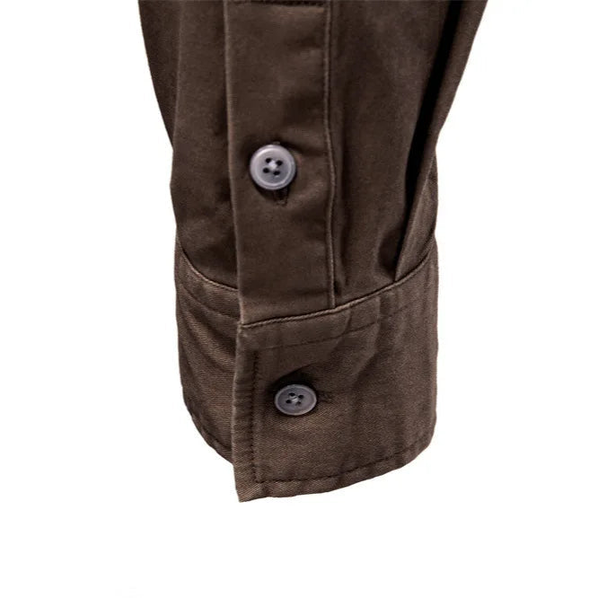 Side view of men's Garrison utility shirt. Durable, long sleeve button-down offering versatile everyday style.