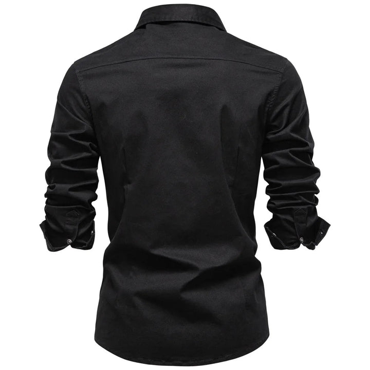 Detail of buttons on men's Garrison utility shirt. Robust long sleeve button-down for casual workwear style.