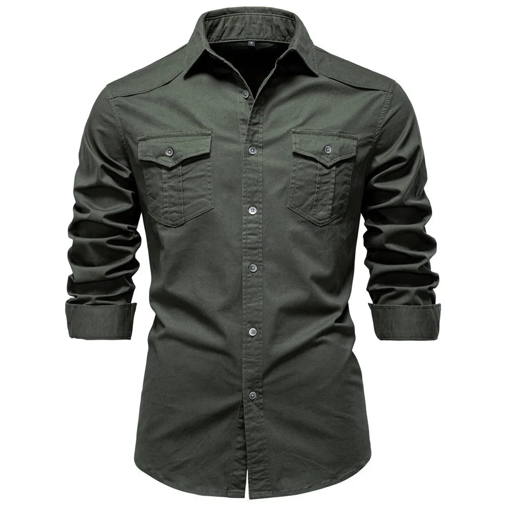 Man wearing a versatile Garrison utility shirt outdoors. Durable long sleeve button-down for active casual wear.