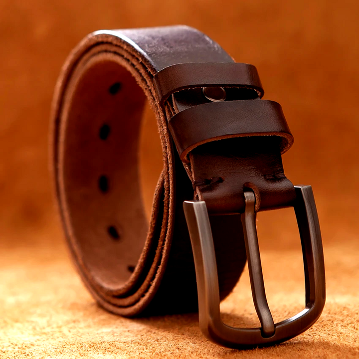 Close-up of a men's genuine cowhide leather belt, showcasing its rich texture and durable craftsmanship.