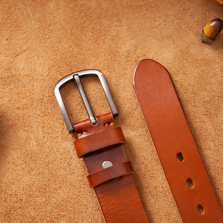 Versatile men's genuine leather belt, a durable brown accessory with a sleek design for any outfit.