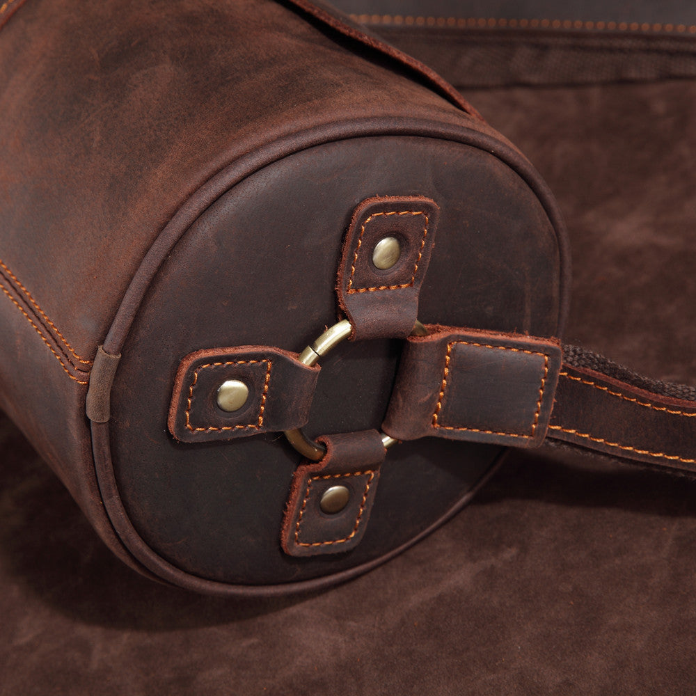 Coffee brown genuine leather men's messenger bag, durable, versatile, & stylish for all needs.