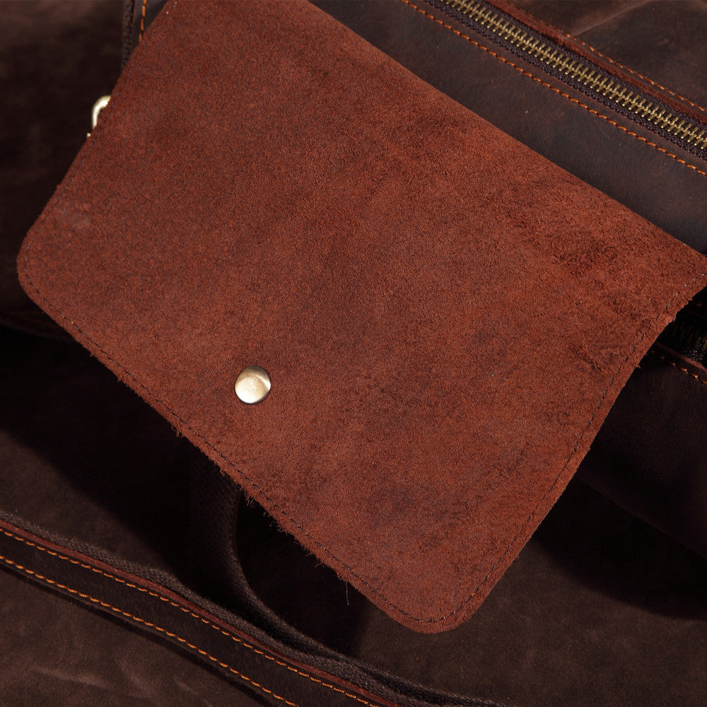 Rugged genuine leather men's messenger bag, highly durable for everyday adventures & travel.