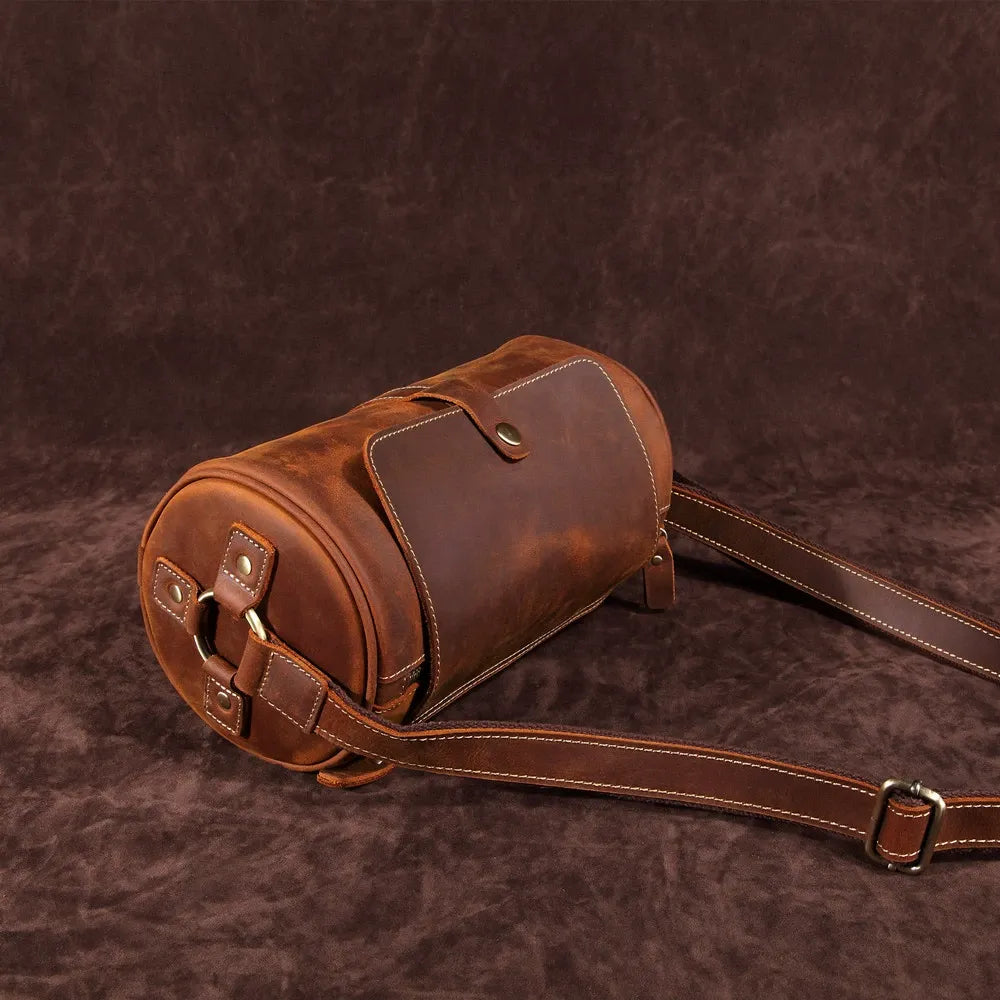 Coffee brown genuine leather messenger bag for men, sleek & practical design for daily carry.