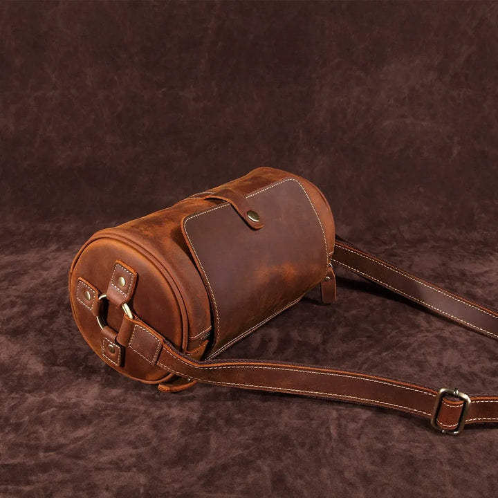 Coffee brown genuine leather messenger bag for men, sleek & practical design for daily carry.
