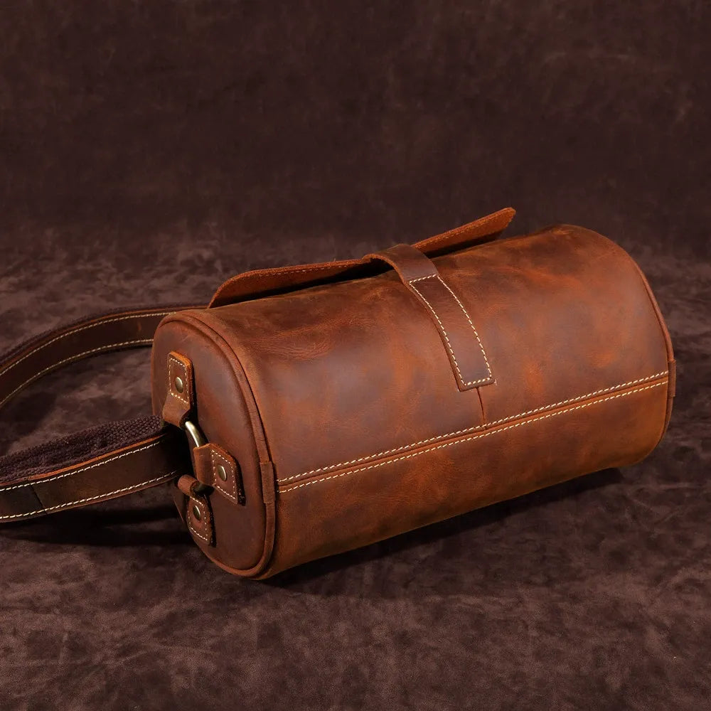 Spacious men's leather messenger bag, genuine & durable, perfect for laptops & travel essentials.