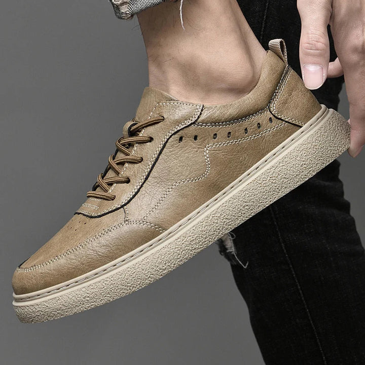 Men's genuine leather perforated sneakers with white rubber sole, perfect for stylish everyday casual wear.