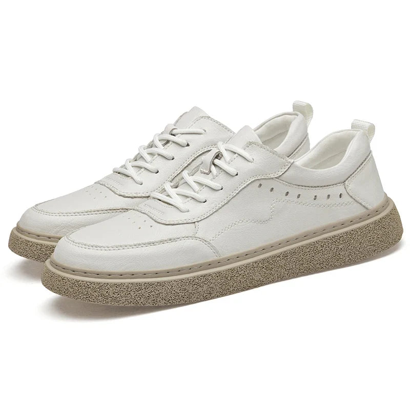 Comfortable men's perforated leather sneakers with soft lining and durable rubber sole, great for everyday wear.