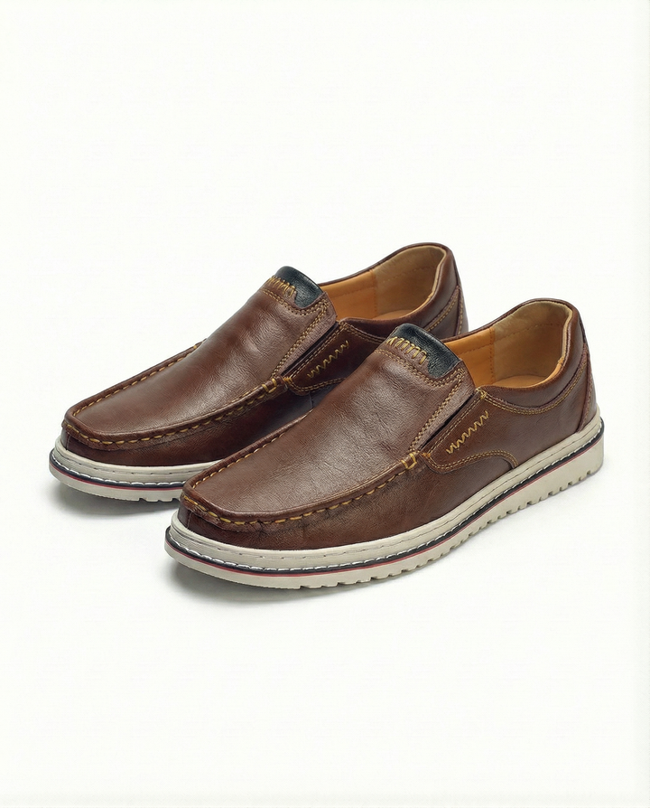 Men's genuine leather slip-on loafers in brown, comfortable for everyday casual wear. Stylish men's shoes.