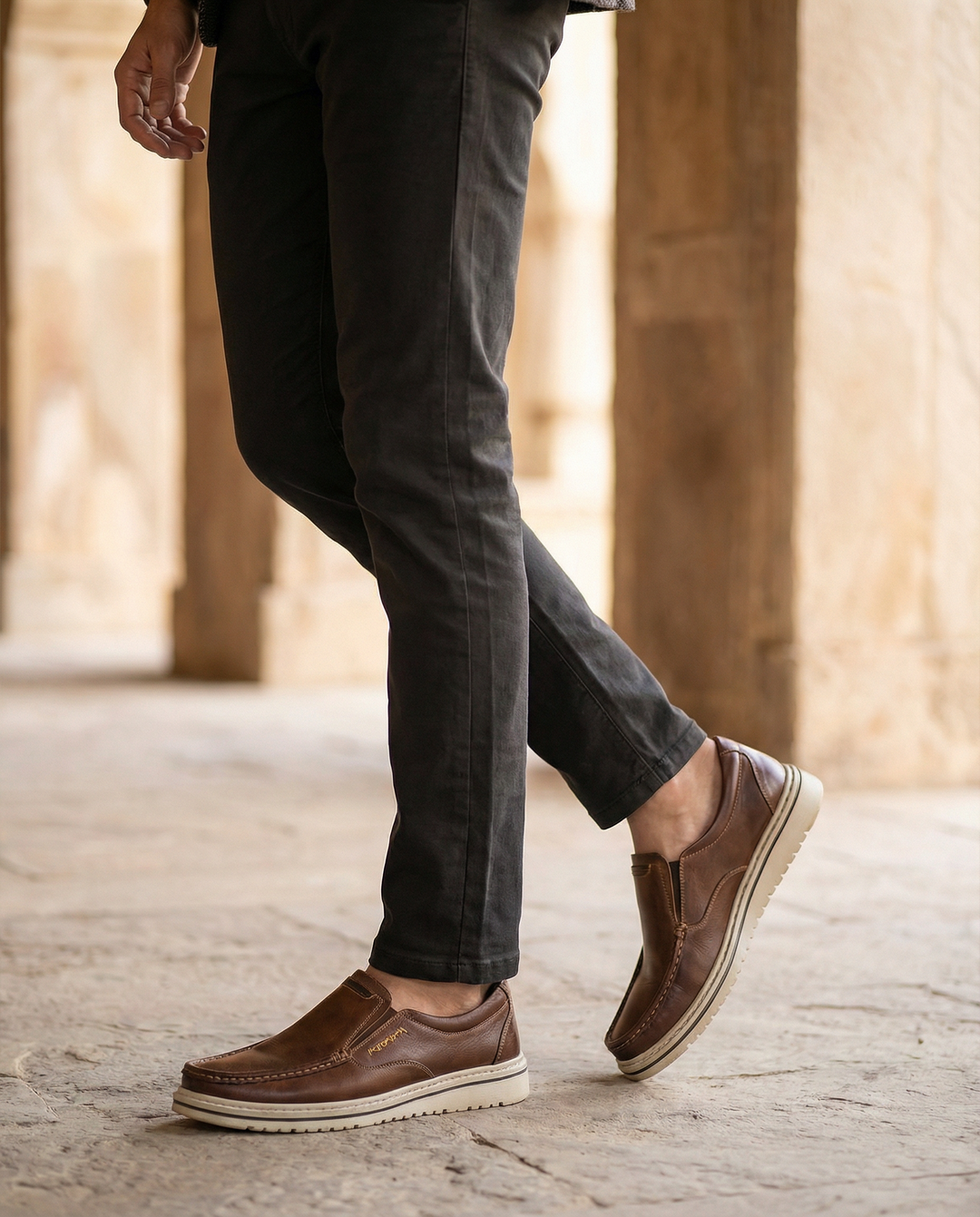 Comfortable men's brown leather slip-on loafers, perfect casual shoes for everyday style.