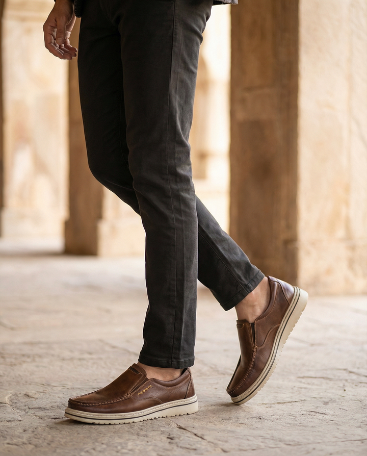 Comfortable men's brown leather slip-on loafers, perfect casual shoes for everyday style.