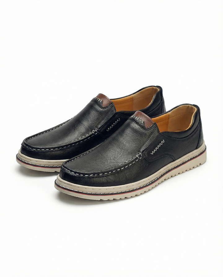 Classic men's brown leather slip-on loafers, designed for ultimate comfort and everyday casual style.