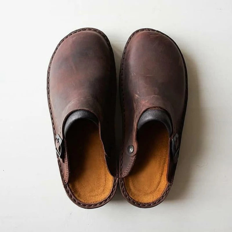 Men's orthotic leather house slippers, offering foot pain relief and enhanced arch support.