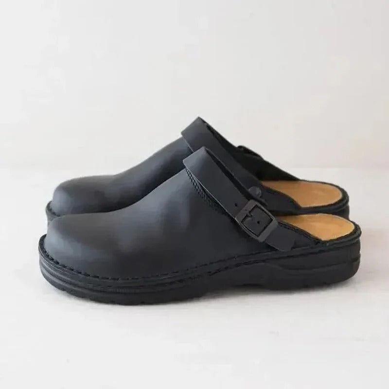 Indoor men's genuine leather slippers, providing orthotic support & relief for daily wear.